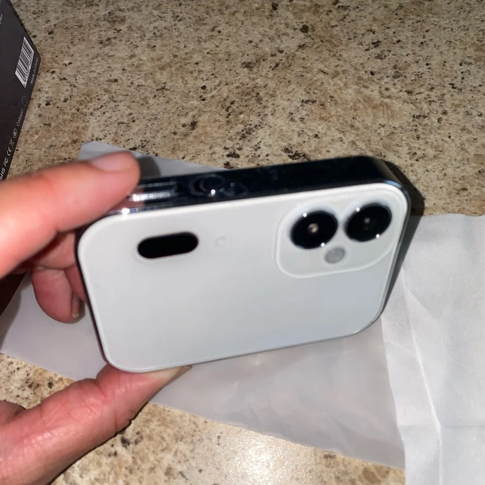 White and Black Touchscreen Music Camera